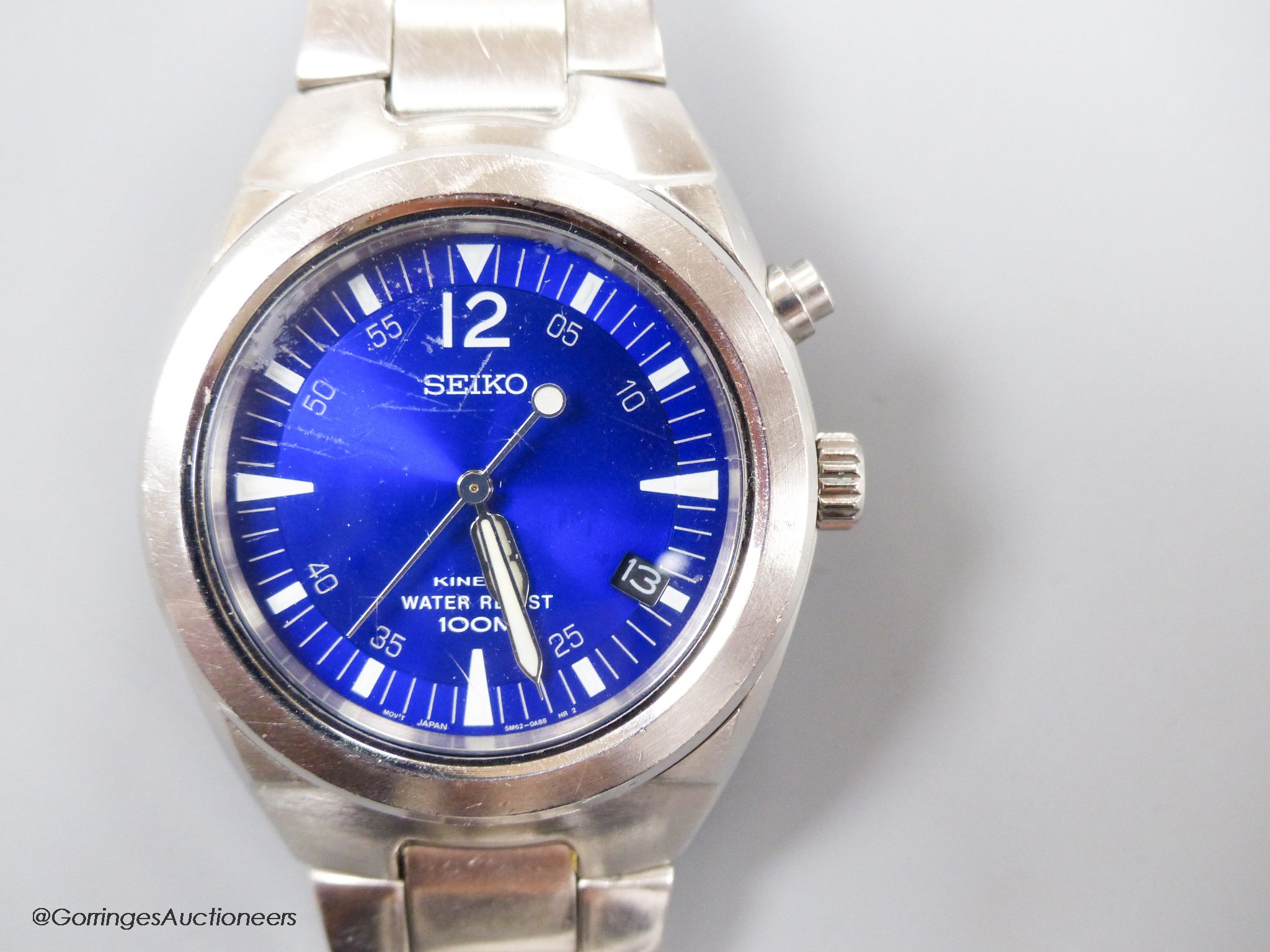 A gentleman's modern stainless steel Seiko Kinetic Waterproof 100M wrist watch, with blue dial, on stainless steel Seiko bracelet, case diameter 39mm excl. crown.